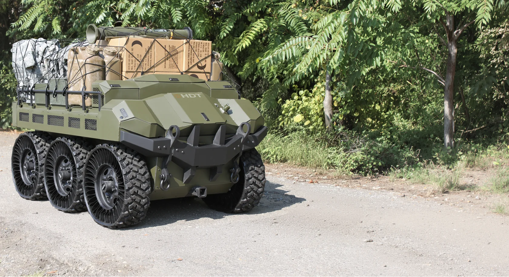 HDT Robotics Hunter WOLF UGV with 2800 lb payload of supplies: Army GOAT, SMET